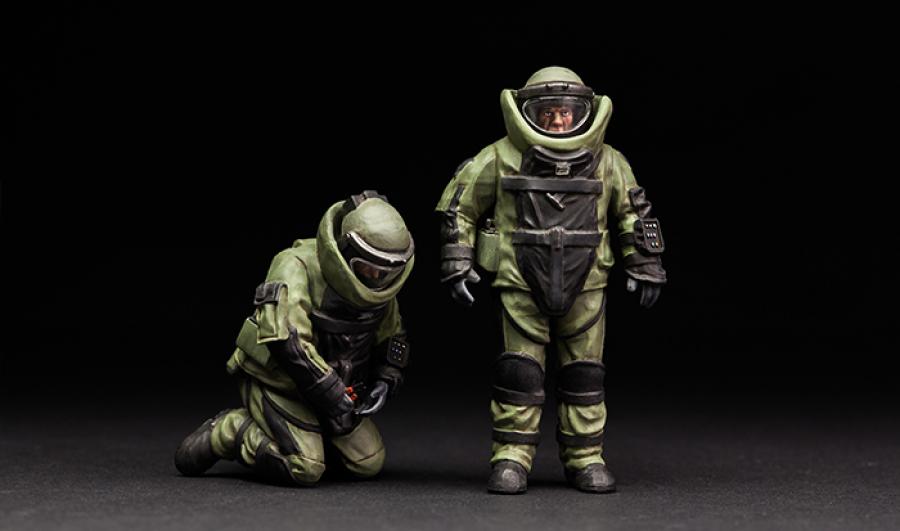 1:35 U.S. explosive ordnance disposal specialists and robot
